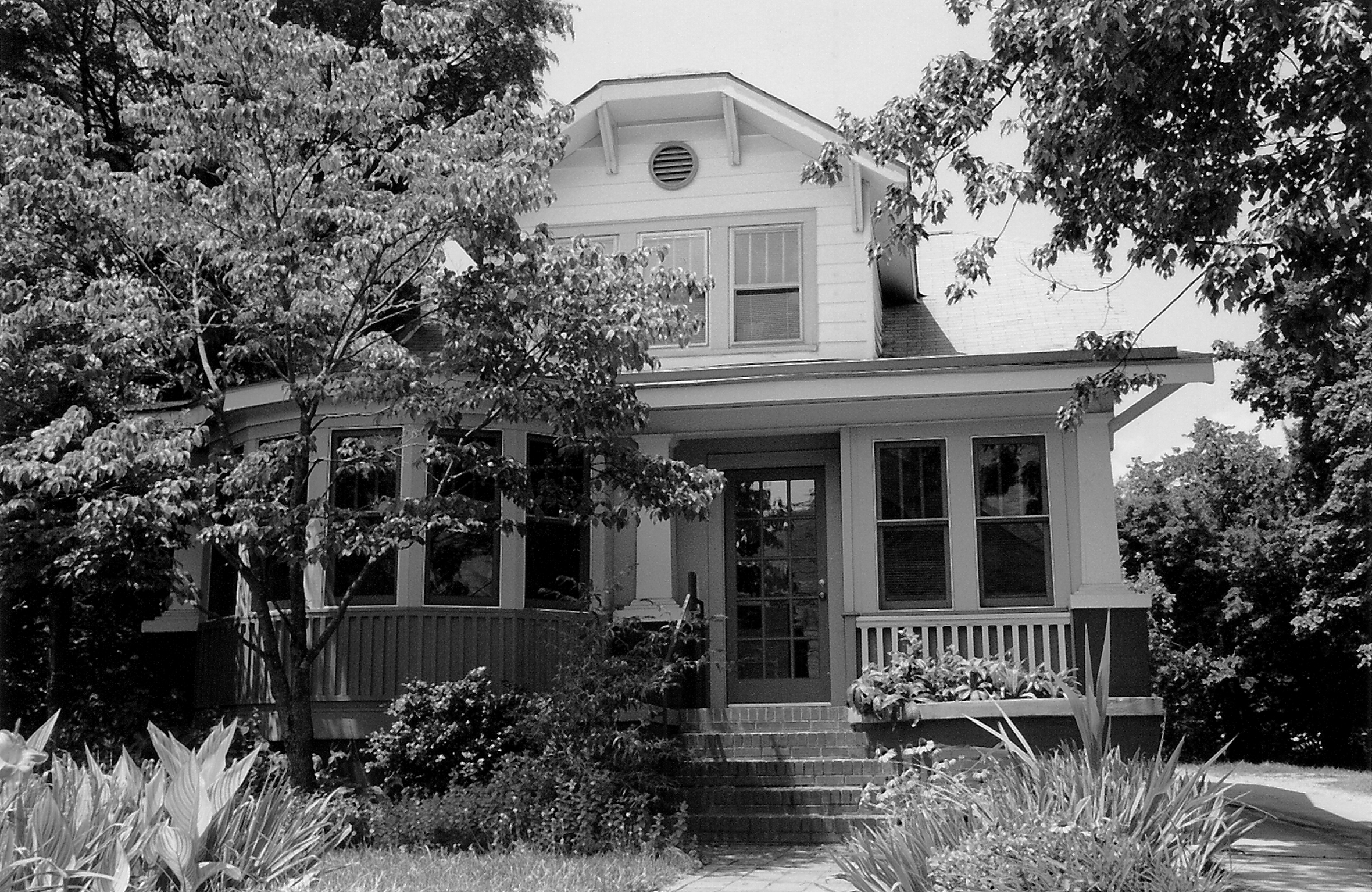 Two-story bungalow in Chapel Hill, North Carolina. It is the Sun’s former office at 107 North Roberson Street.