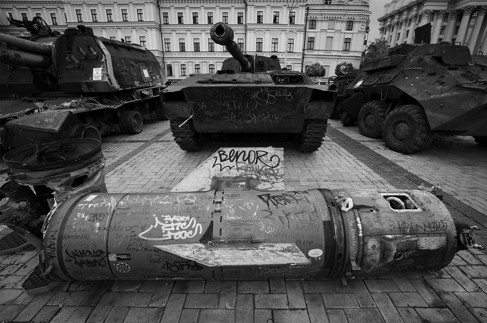 Russian military rockets and vehicles on a square in Kyiv.