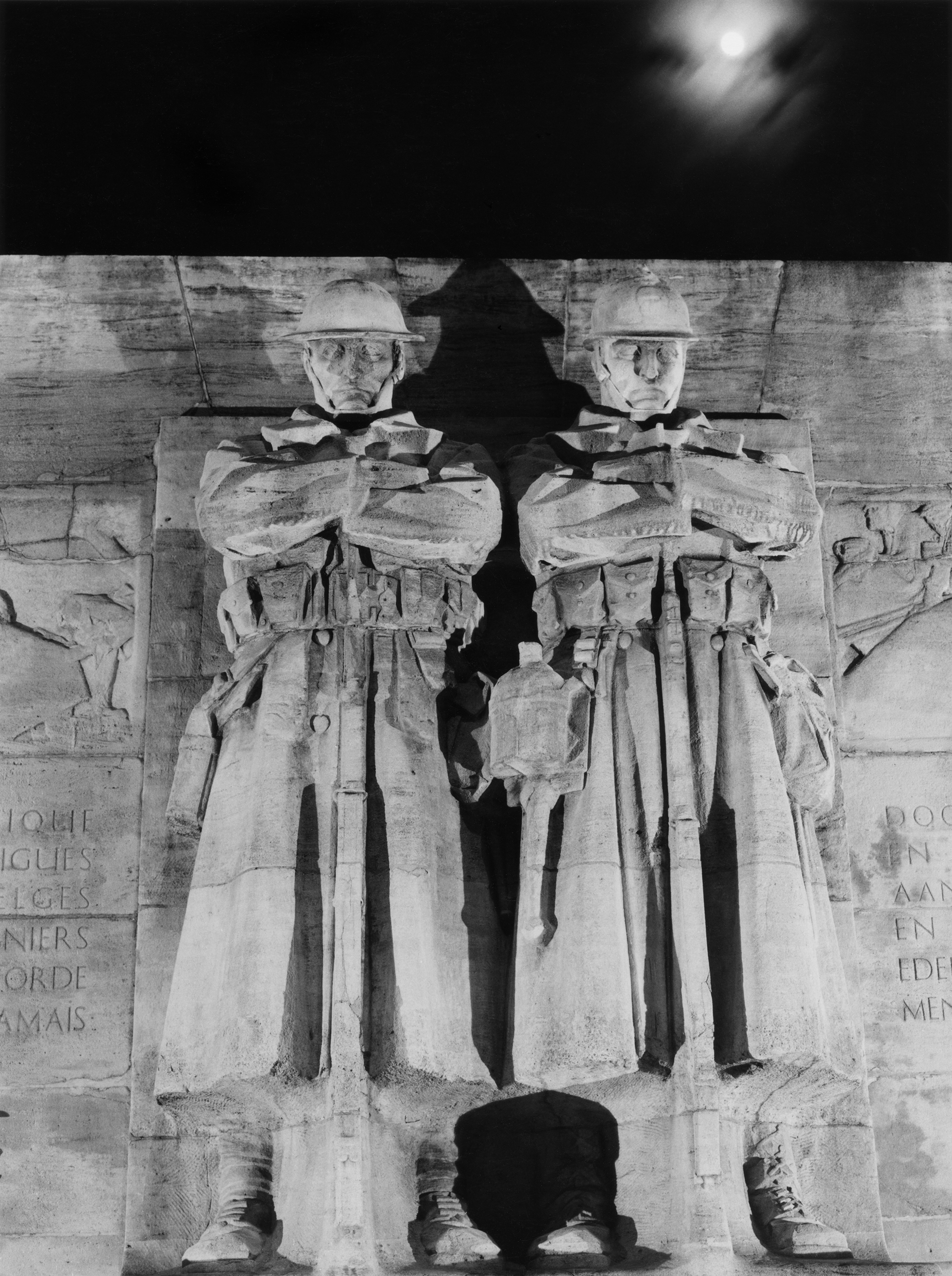 The Anglo-Belgian War Memorial in Brussels, Belgium, depicts a British and a Belgian soldier standing side by side with arms crossed carved in stone.