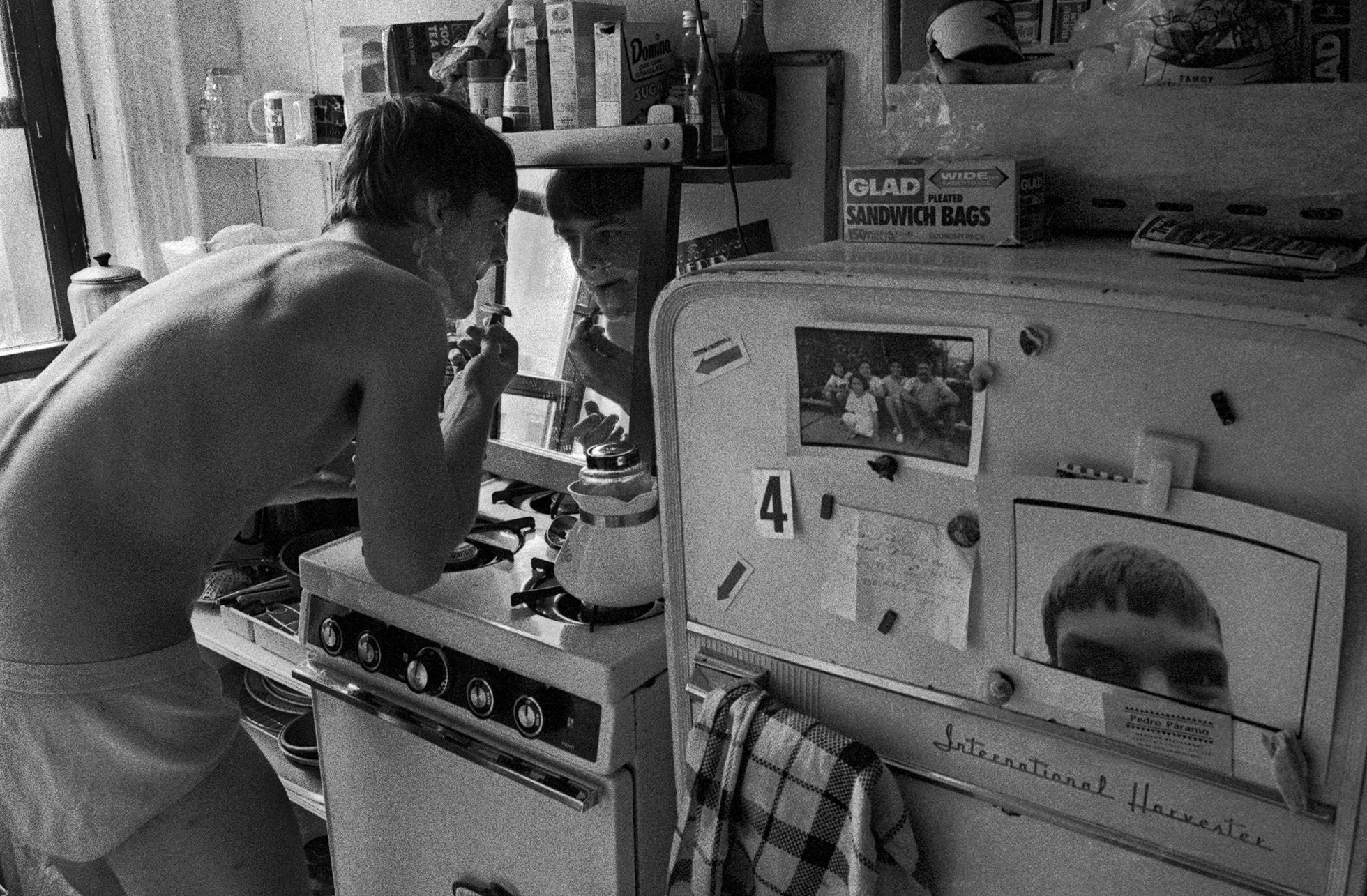 In the early 1990s the photographer shared a 450-square-foot New York City apartment with two friends. The bathroom had no sink, so they hung a mirror above the stove.